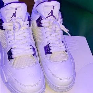 Purple metallic jordan 4’s